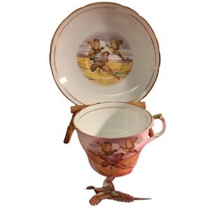Regency, Cup & Saucer with Pheasant flying in orange evening sky. Bone‎ China